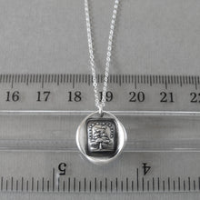 Load image into Gallery viewer, Wax seal necklace depicting evergreen tree and Italian motto "Grow, Don't Change". Antique wax seal charm jewelry made in silver.