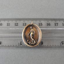 Load image into Gallery viewer, Wax seal pendant depicting Venus, goddess of love, standing on a shell drawn by a team of dolphins. Antique wax seal charm jewelry made in solid bronze.