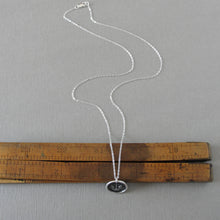 Load image into Gallery viewer, Silver wax seal necklace symbolizing protected strength and success