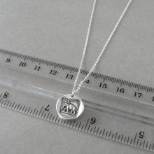 Load image into Gallery viewer, Wax seal necklace with elephant and French inspirational motto &quot;Reason Is My Strength&quot;. Antique wax seal charm jewelry in silver.
