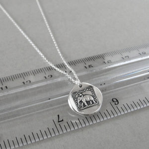 Wax seal necklace with elephant and French inspirational motto "Reason Is My Strength". Antique wax seal charm jewelry in silver.