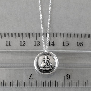 Wax seal necklace with the symbols for Faith Hope and Love. Antique wax seal charm jewelry with cross, anchor and heart made in silver by RQP Studio.
