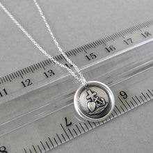 Load image into Gallery viewer, Wax seal necklace with the symbols for Faith Hope and Love. Antique wax seal charm jewelry with cross, anchor and heart made in silver by RQP Studio.

