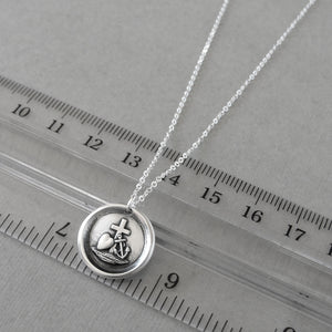 Wax seal necklace with the symbols for Faith Hope and Love. Antique wax seal charm jewelry with cross, anchor and heart made in silver by RQP Studio.
