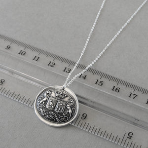 Wax seal necklace with unicorns, birds, stars, and Latin motto with promise of time. Antique wax seal charm jewelry crest made in silver.
