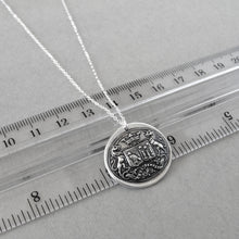 Load image into Gallery viewer, Wax seal necklace with unicorns, birds, stars, and Latin motto with promise of time. Antique wax seal charm jewelry crest made in silver.

