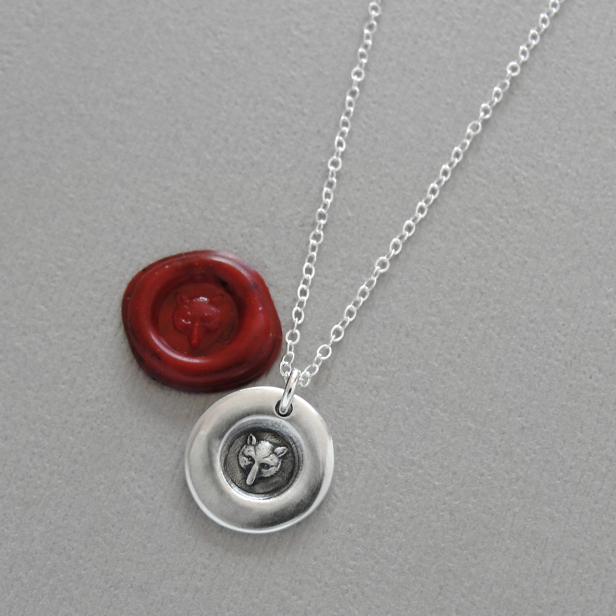Tiny Fox Mask Wax Seal Necklace In Silver Symbolizing Wisdom Wit