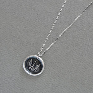 Silver wax seal necklace symbolizing protected strength and success